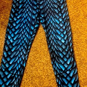 Feed Me Fight Me dragon leggings.